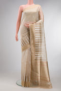 Cream Dual Tone Banarasi Silk Saree with Zari Brocade on the body and Zari Border.  displayed on a mannequin
