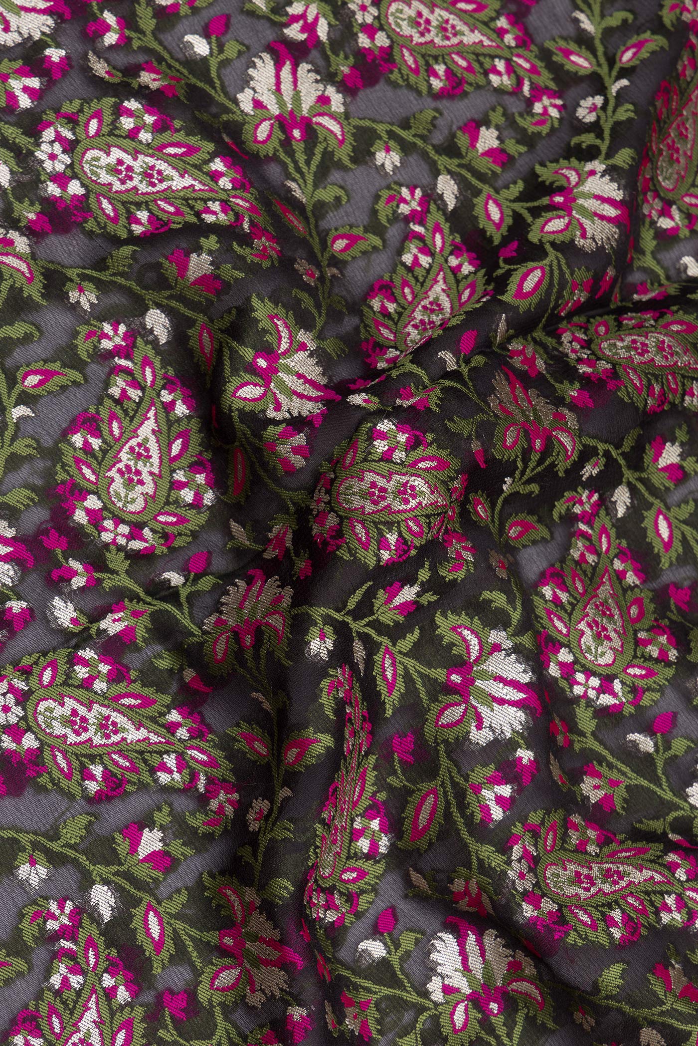 Close up of Black Banarasi Georgette Saree with Thread Brocade on the body and Thread Border.  displaying folds