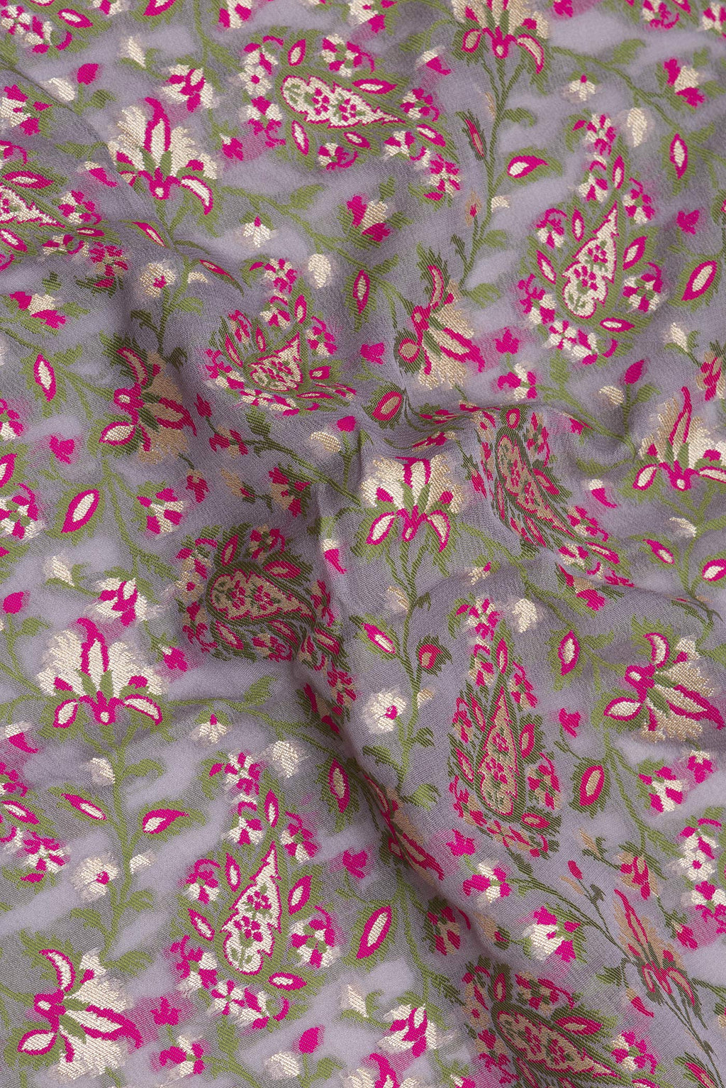 Close up of Grey Banarasi Georgette Saree with Thread Brocade on the body and Thread Border.  displaying folds