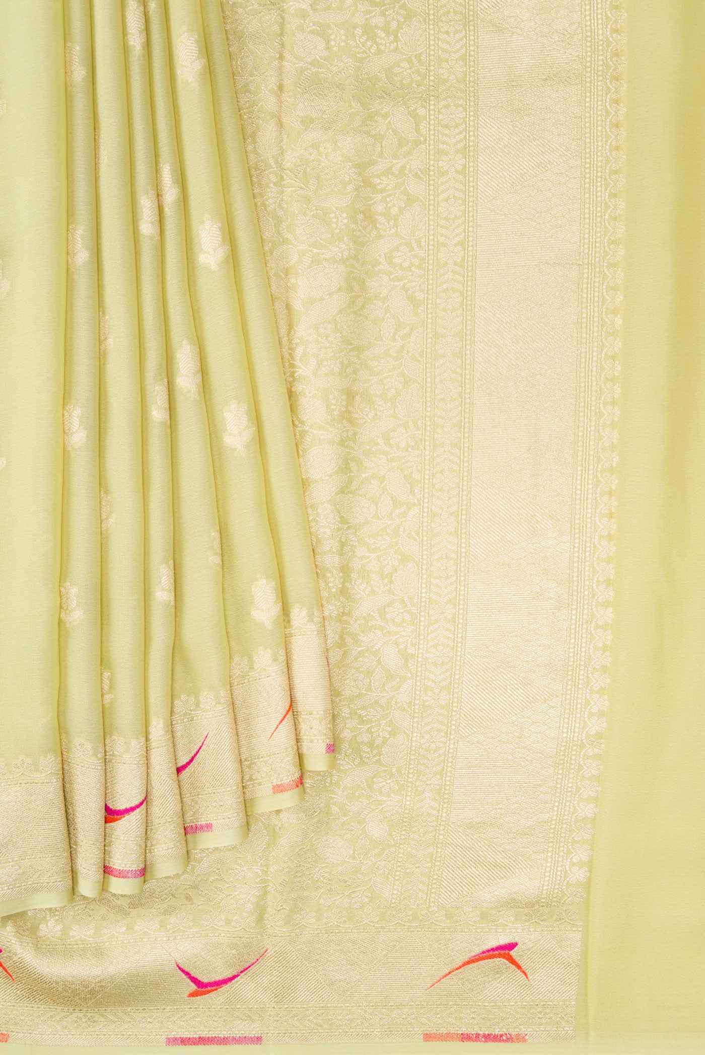 Pleats and pallu of Pista Green Banarasi Georgette Saree with Zari Butta on the body and Fancy Border. 