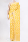 Yellow Banarasi Georgette Saree with Zari Brocade on the body and Zari Border.  displayed on a mannequin