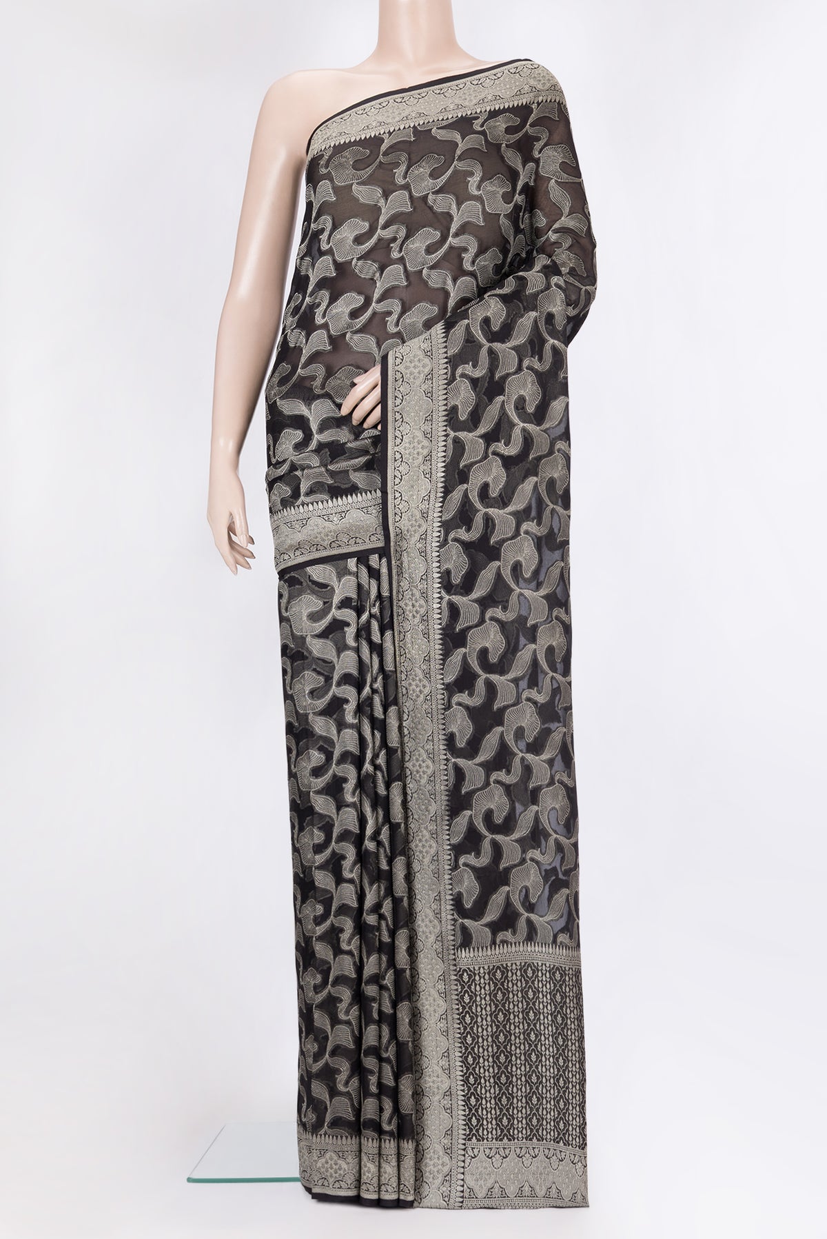 Black Banarasi Georgette Saree with Zari Brocade on the body and Zari Border.  displayed on a mannequin