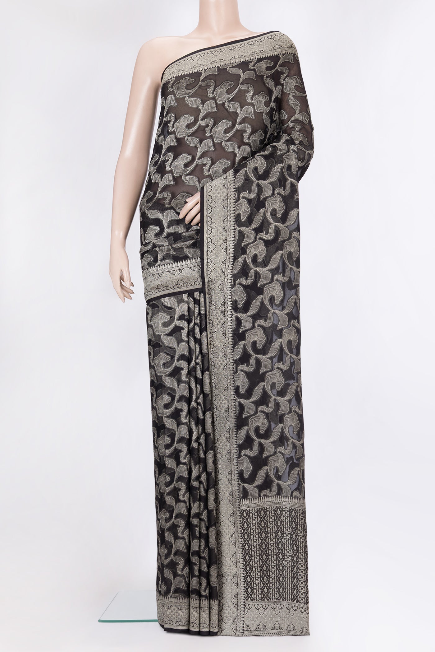 Black Banarasi Georgette Saree with Zari Brocade on the body and Zari Border.  displayed on a mannequin