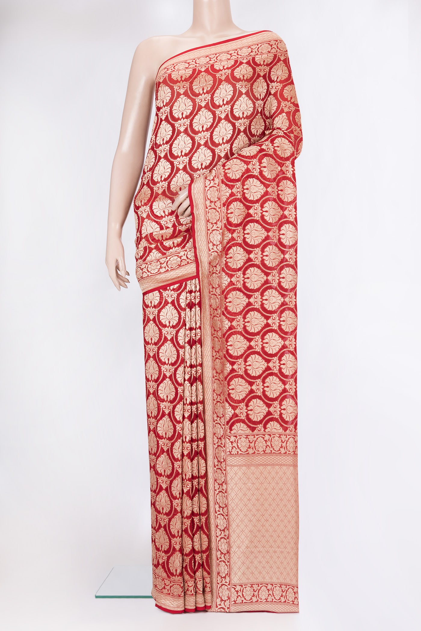 Red Banarasi Georgette Saree with Zari Brocade on the body and Zari Border.  displayed on a mannequin
