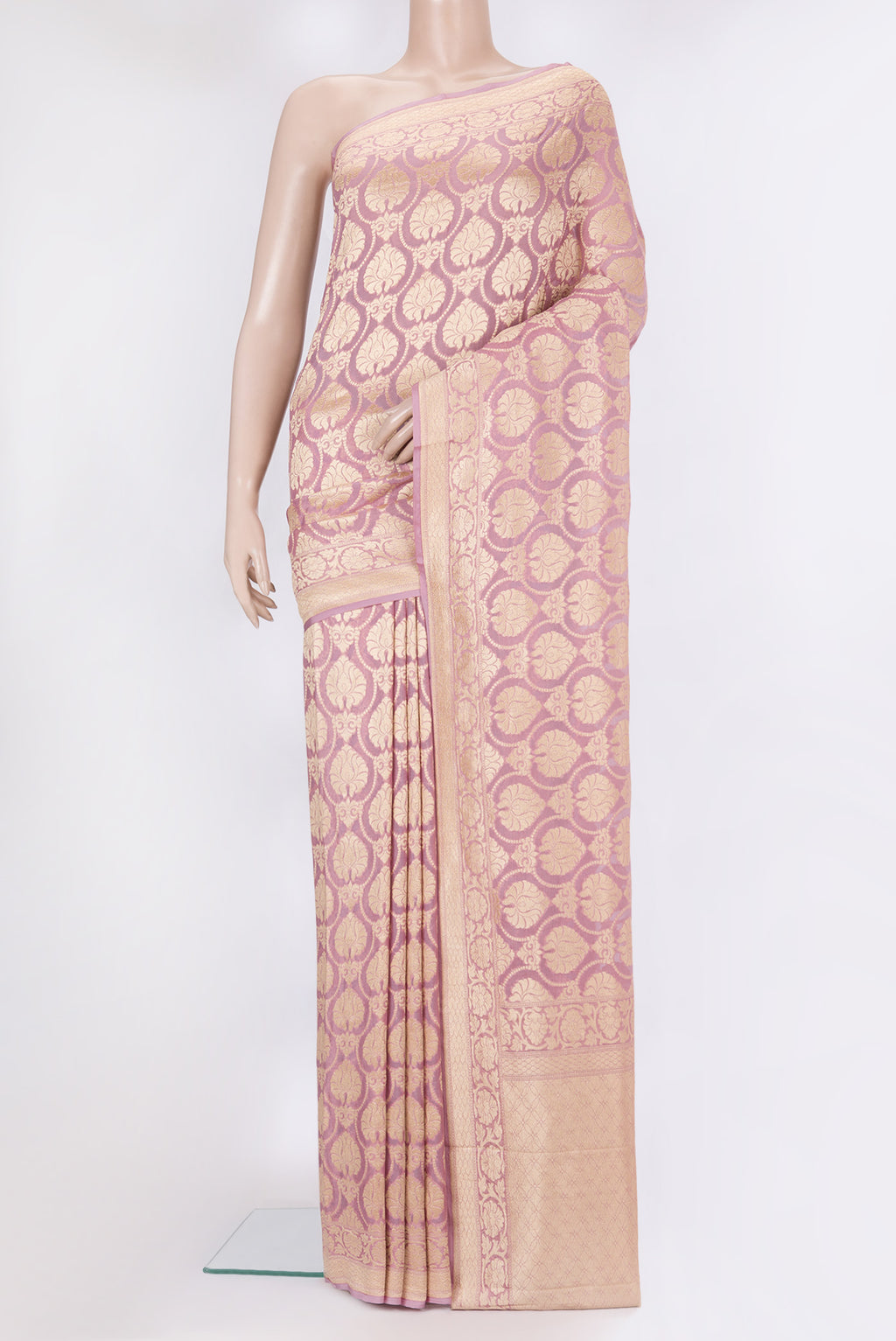 Rose pink Banarasi Georgette Saree with Zari Brocade on the body and Zari Border.  displayed on a mannequin