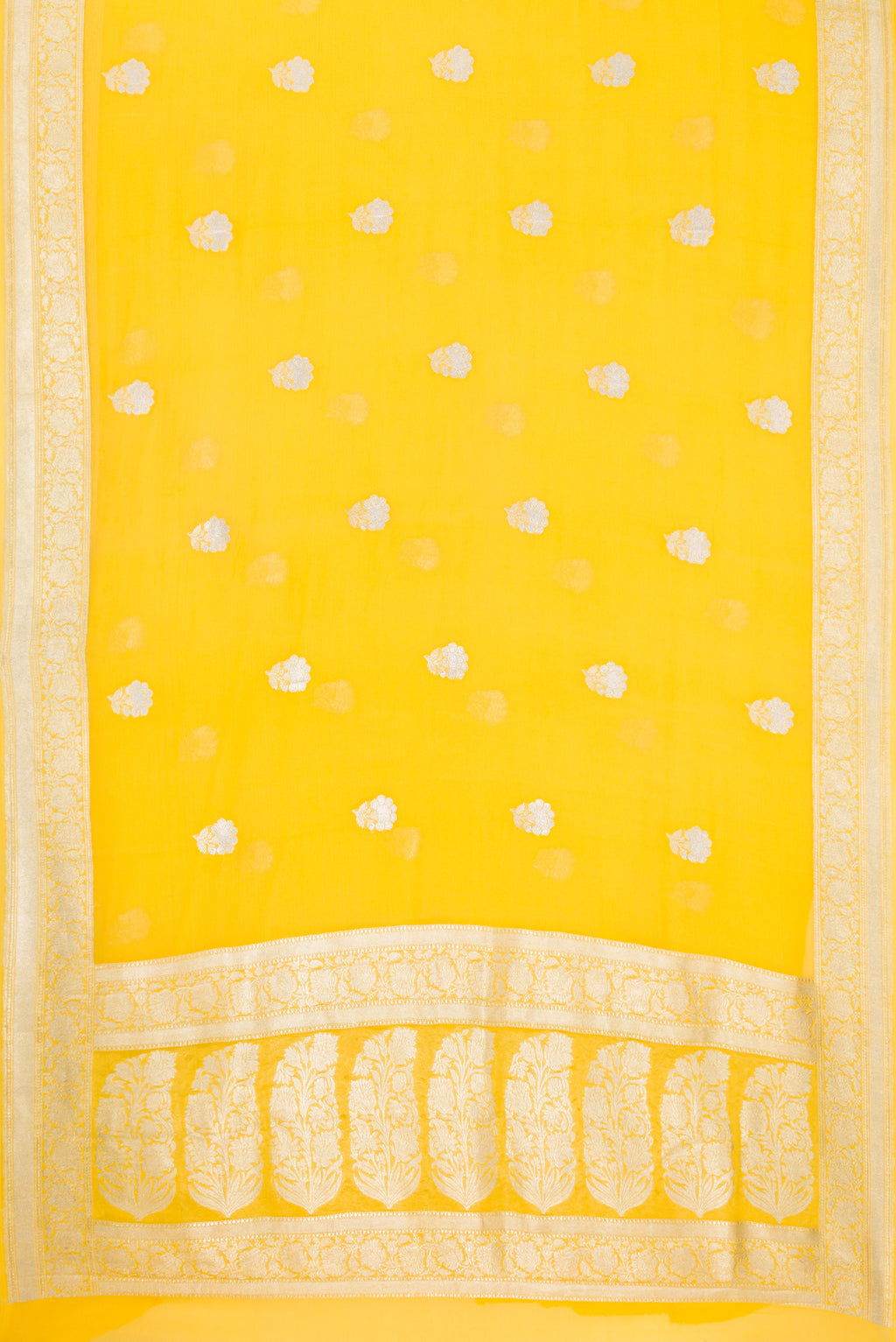 Flat view of Yellow Banarasi Georgette Saree with Zari Butta on the body and Zari Border. 