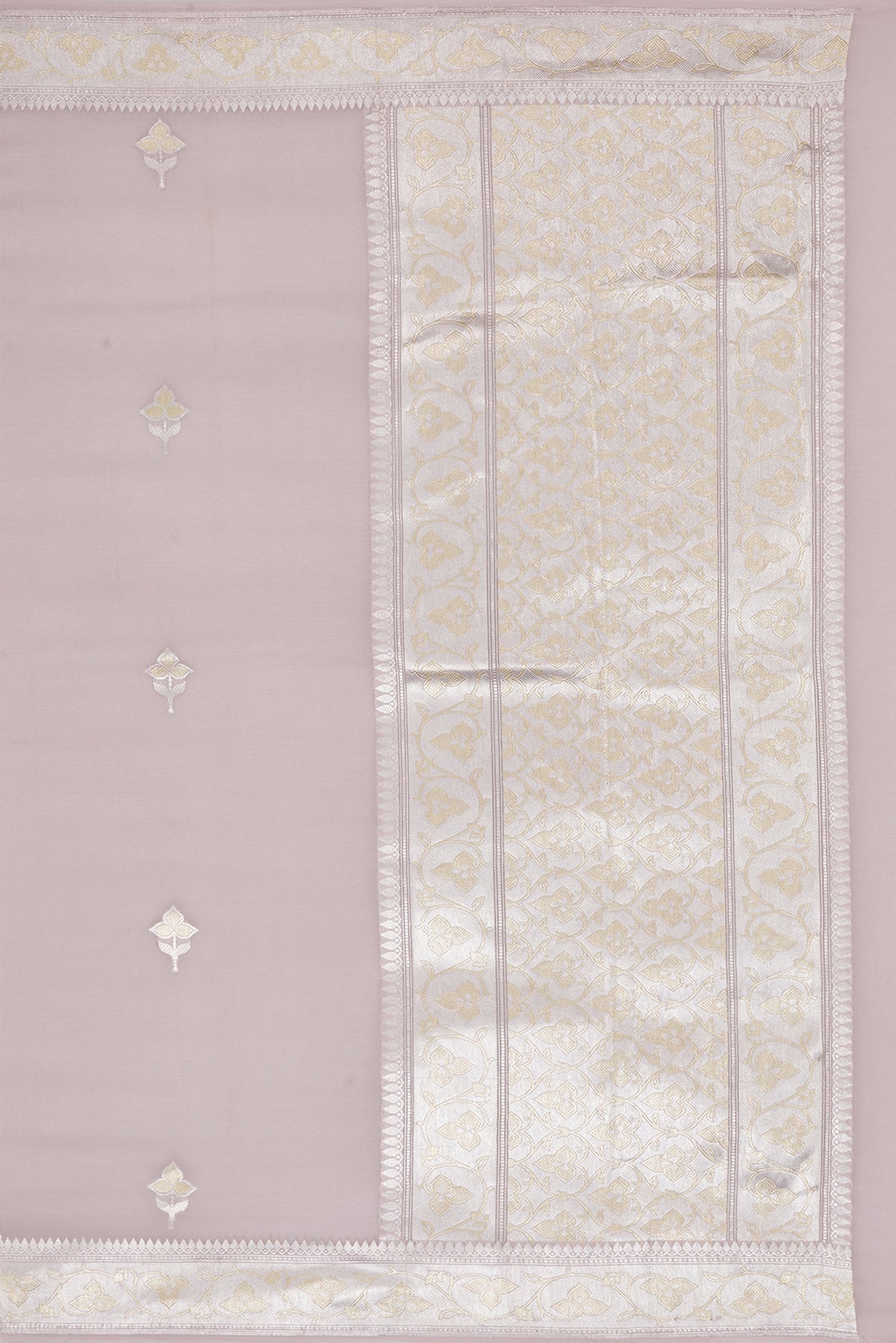 Close up image of the pallu of Rose Gold Banarasi Georgette Saree with Zari Butta on the body and Zari Border. 