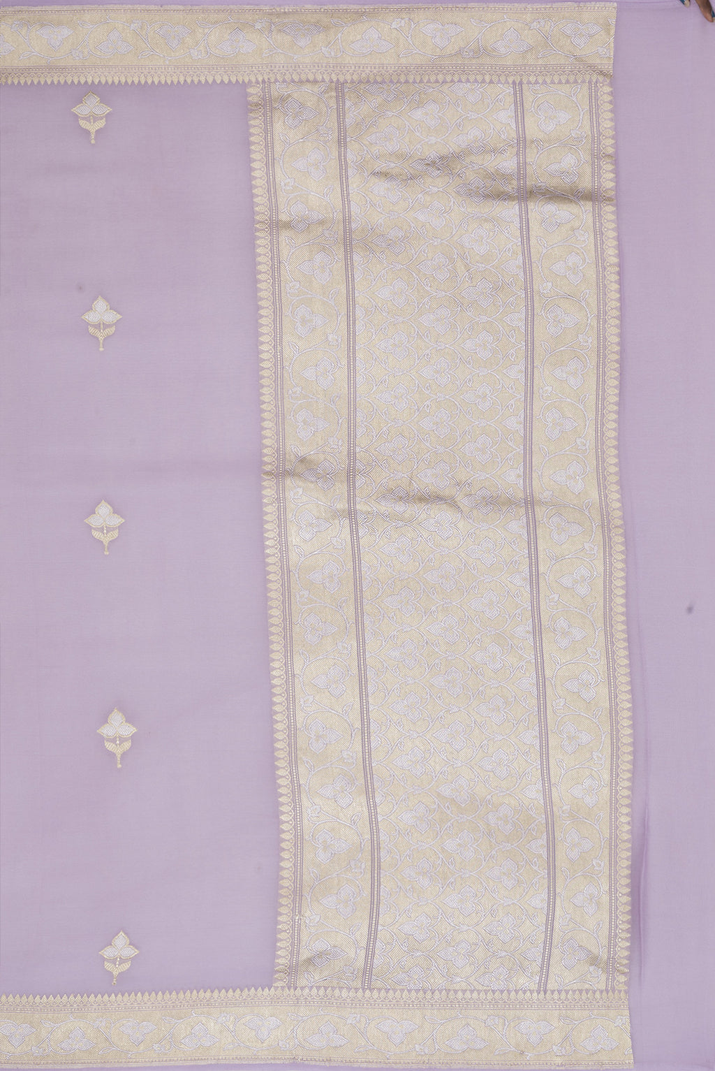 Close up image of the pallu of Lavender Banarasi Georgette Saree with Zari Butta on the body and Fancy Border. 