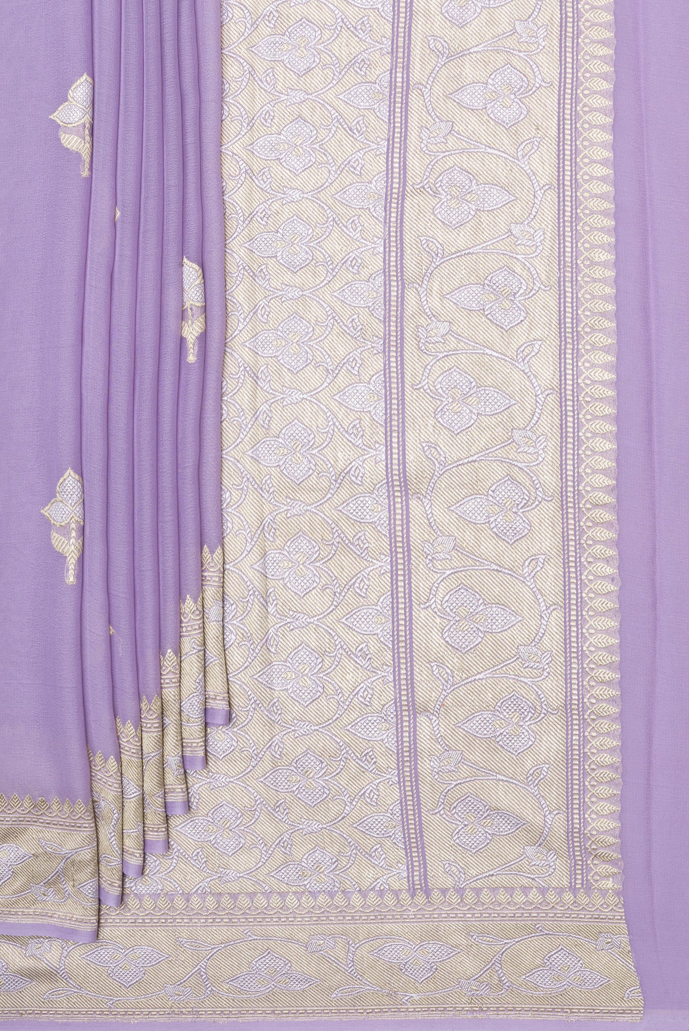 Pleats and pallu of Lavender Banarasi Georgette Saree with Zari Butta on the body and Fancy Border. 