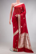 Red Banarasi Georgette Saree with Zari Butta on the body and Zari Border.  displayed on a mannequin