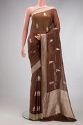 Brown Banarasi Georgette Saree with Zari Butta on the body and Fancy Border.  displayed on a mannequin