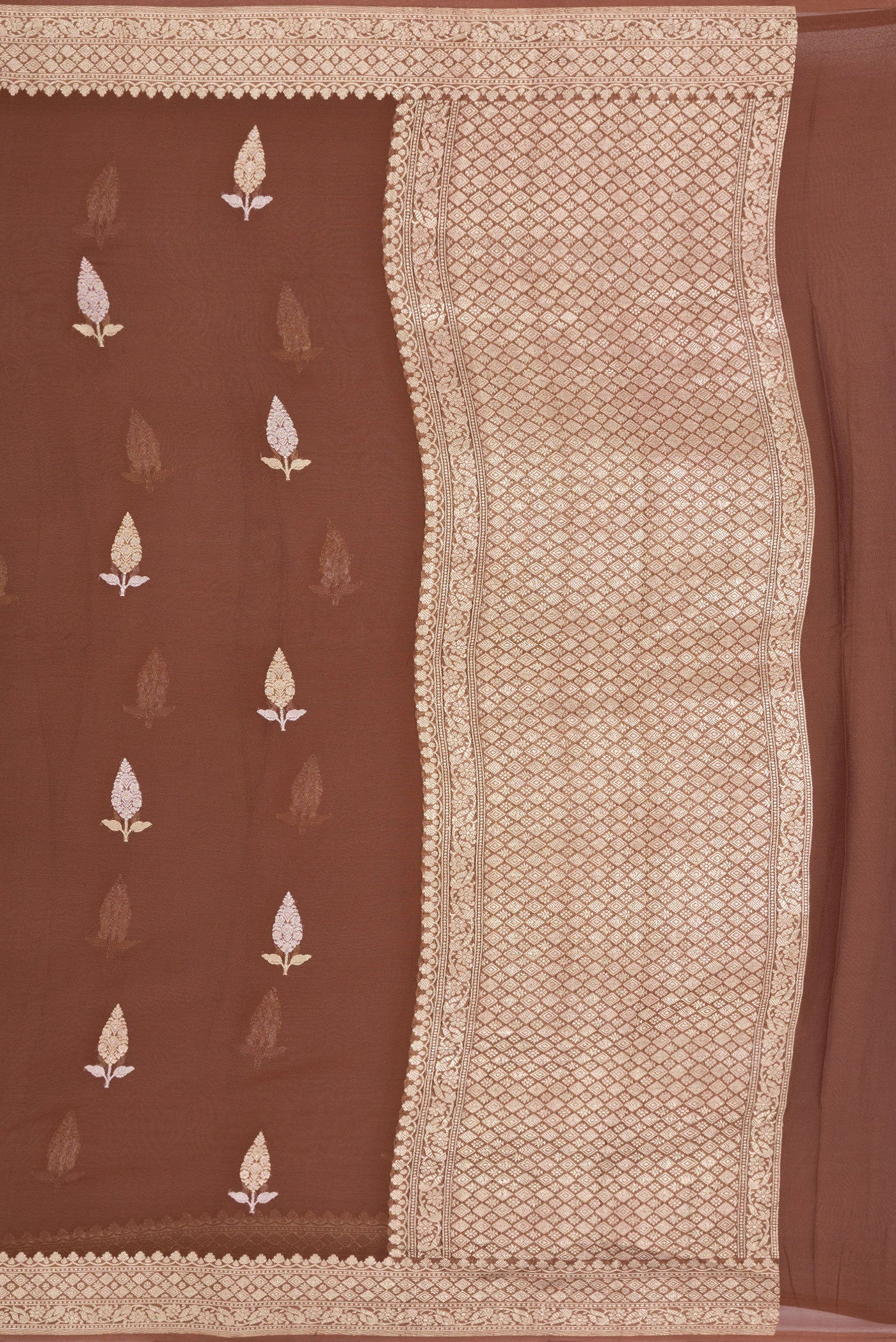 Close up image of the pallu of Brown Banarasi Georgette Saree with Zari Butta on the body and Fancy Border. 