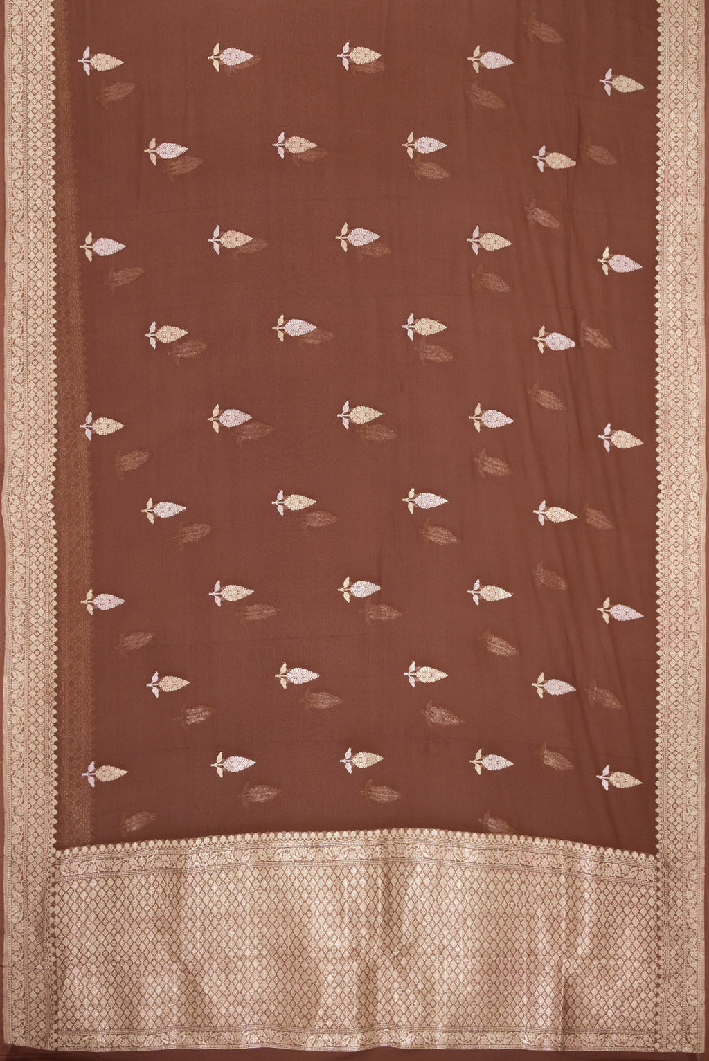 Flat view of Brown Banarasi Georgette Saree with Zari Butta on the body and Fancy Border. 