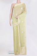 Pista Green Dual Tone Banarasi Georgette Saree with Zari Butta on the body and Fancy Border.  displayed on a mannequin