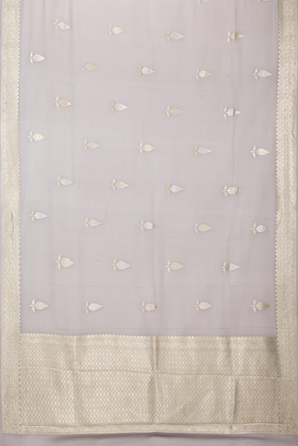 Flat view of Grey Banarasi Georgette Saree with Zari Butta on the body and Zari Border. 