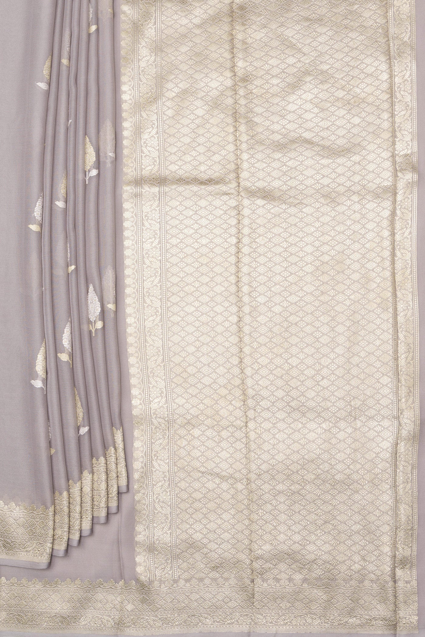 Pleats and pallu of Grey Banarasi Georgette Saree with Zari Butta on the body and Zari Border. 
