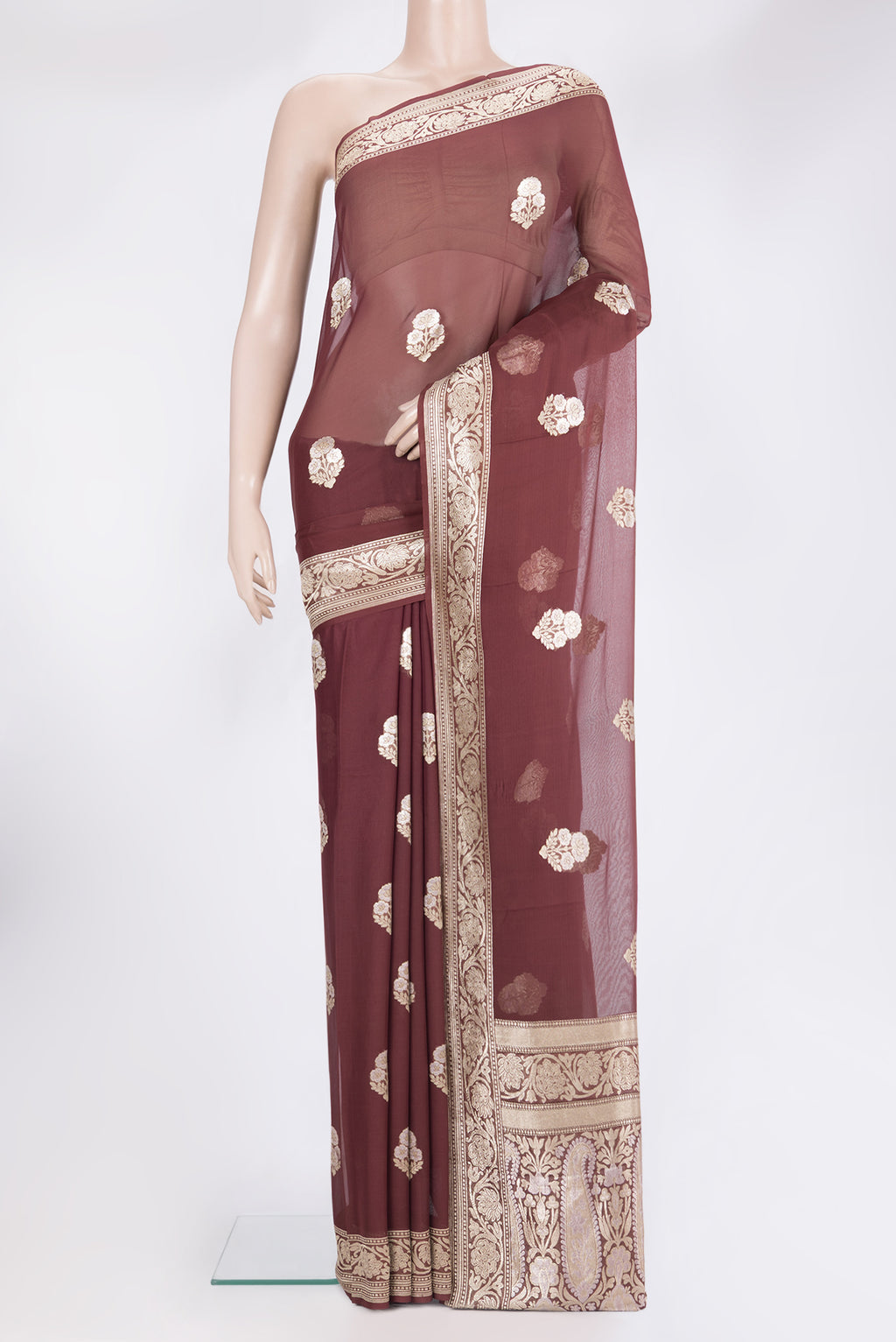 Brown Banarasi Georgette Saree with Zari Butta on the body and Zari Border.  displayed on a mannequin