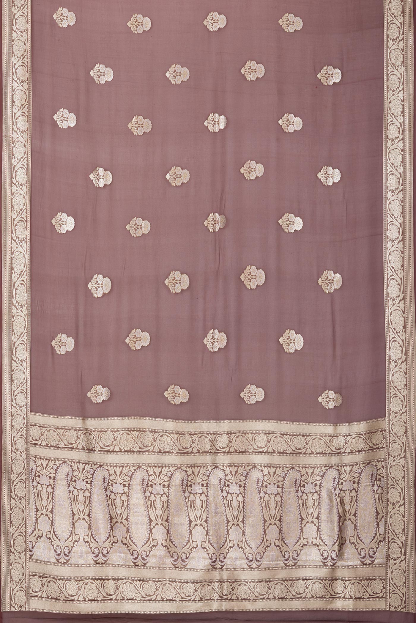 Flat view of Brown Banarasi Georgette Saree with Zari Butta on the body and Zari Border. 