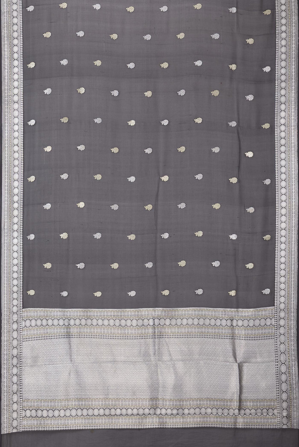Flat view of Black Banarasi Georgette Saree with Zari Butta on the body and Zari Border. 