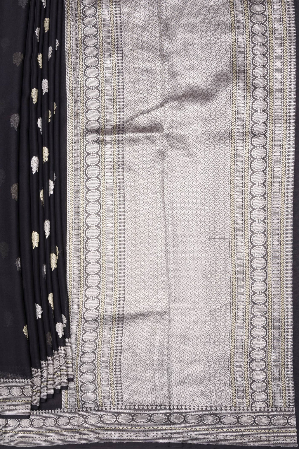Pleats and pallu of Black Banarasi Georgette Saree with Zari Butta on the body and Zari Border. 