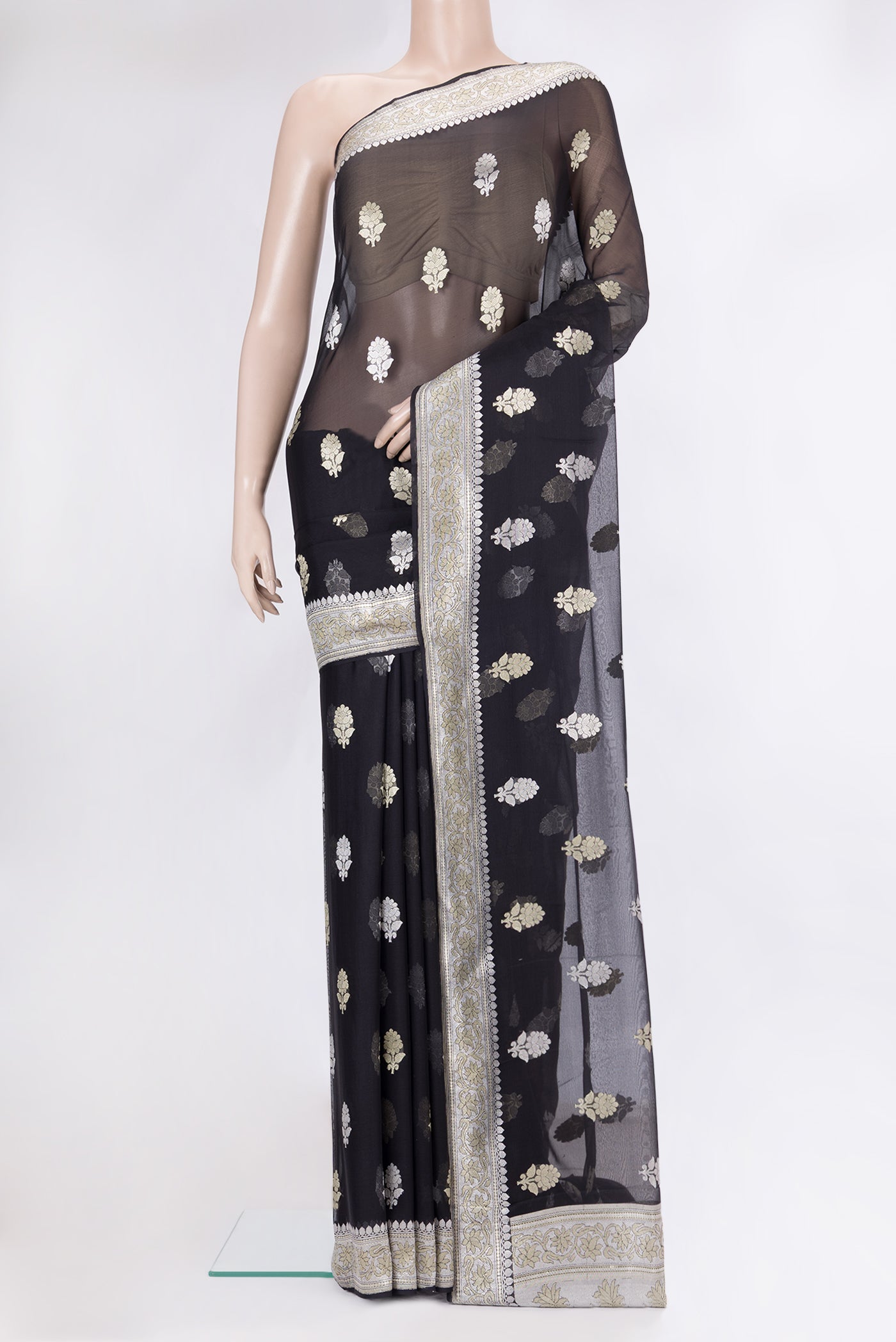 Black Banarasi Georgette Saree with Zari Butta on the body and Zari Border.  displayed on a mannequin