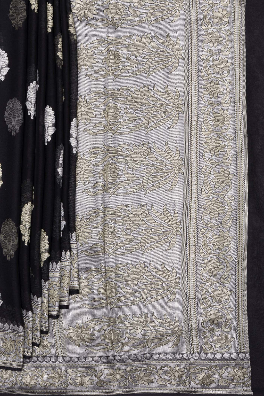 Pleats and pallu of Black Banarasi Georgette Saree with Zari Butta on the body and Zari Border. 
