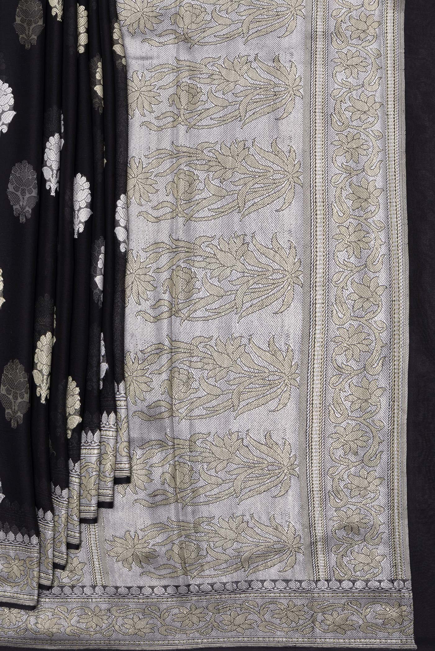 Pleats and pallu of Black Banarasi Georgette Saree with Zari Butta on the body and Zari Border. 