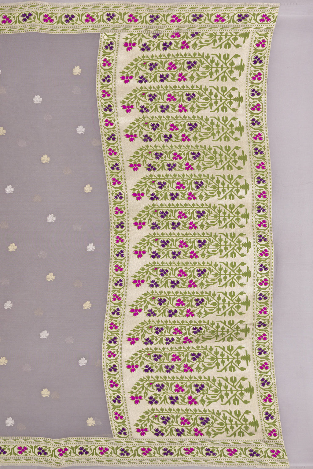 Close up image of the pallu of Grey Banarasi Georgette Saree with Zari Butta on the body and Fancy Border. 