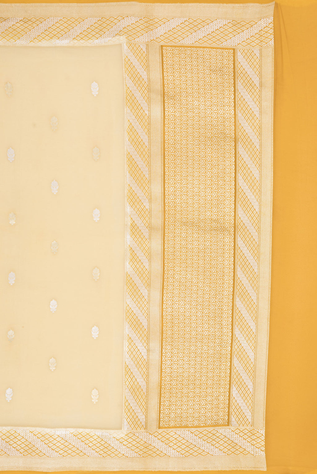 Close up image of the pallu of Sandal Banarasi Georgette Saree with Zari Butta on the body and Zari Border. 