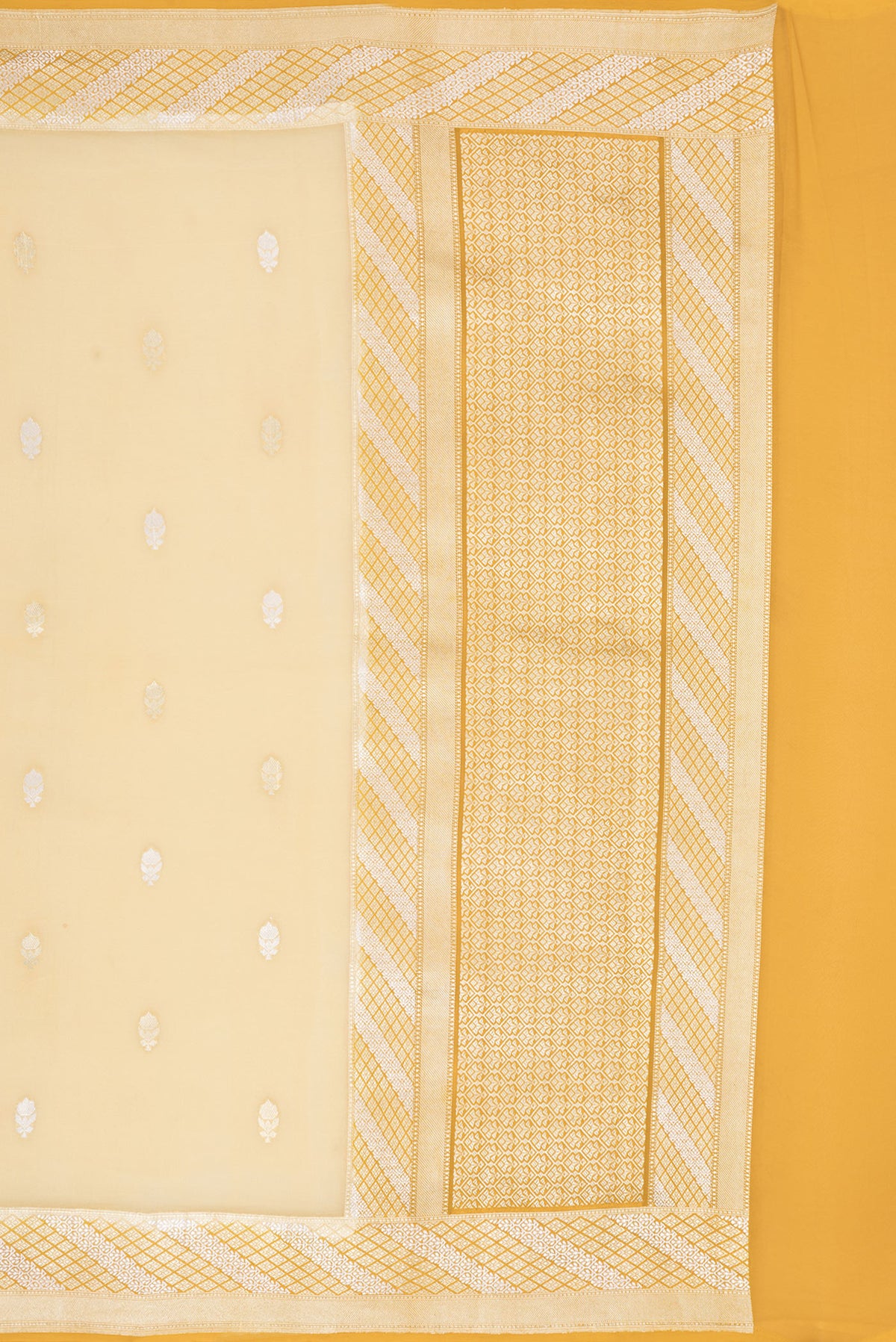 Close up image of the pallu of Sandal Banarasi Georgette Saree with Zari Butta on the body and Zari Border. 