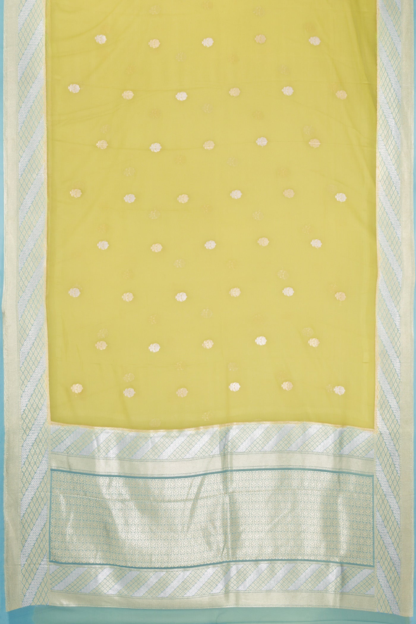 Flat view of Pista Green Banarasi Georgette Saree with Zari Butta on the body and Fancy Border. 