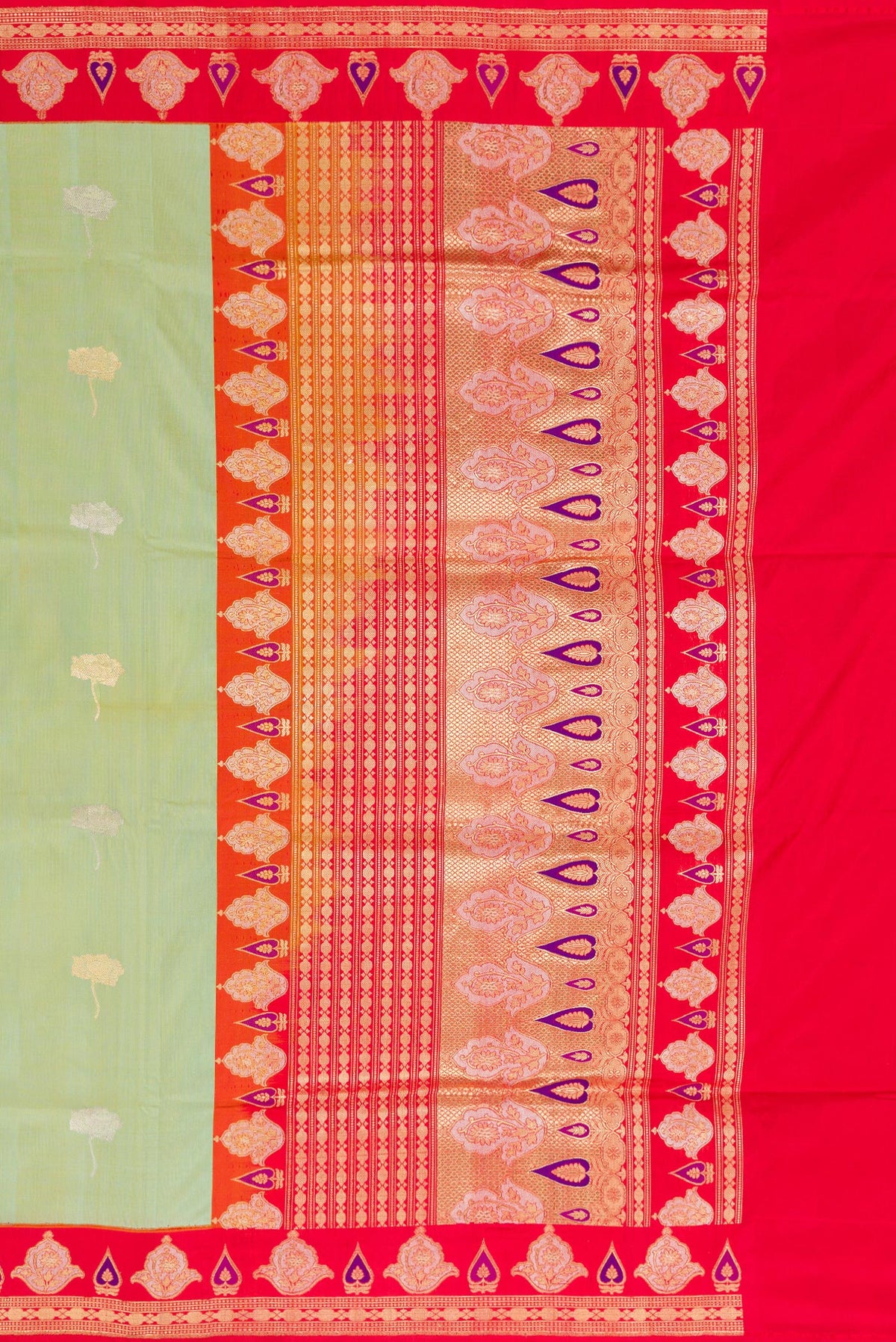 Close up image of the pallu of Pure Silk Pista Green Banarasi Saree with Zari Butta on the body and Fancy Border. 