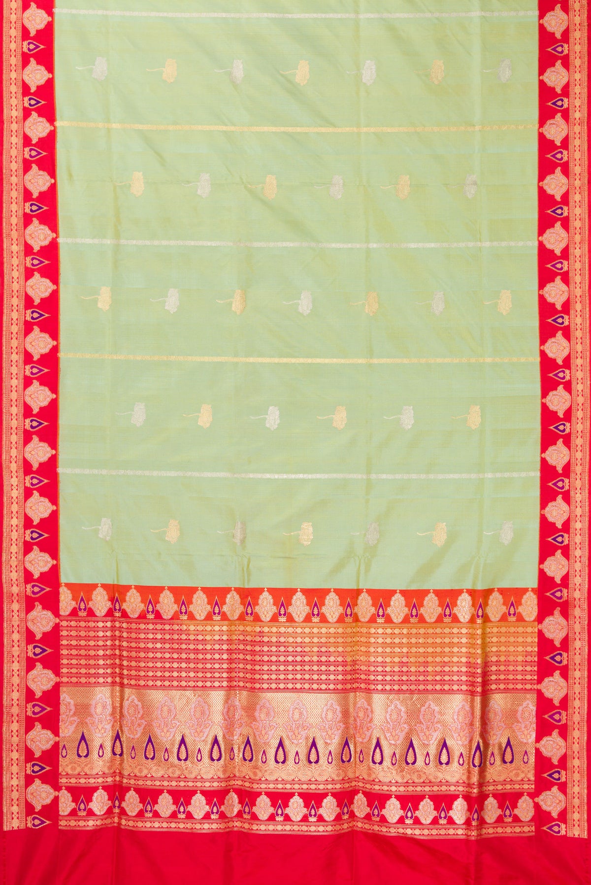 Flat view of Pure Silk Pista Green Banarasi Saree with Zari Butta on the body and Fancy Border. 