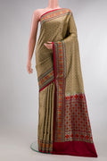 Pure Silk Beige Dual Tone Banarasi Saree with Jacquard design on the body and Fancy Border.  displayed on a mannequin