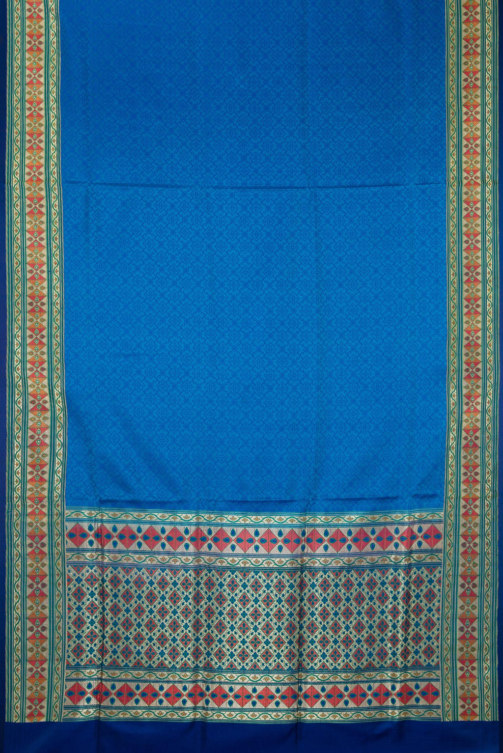 Flat view of Pure Silk Royal Blue Dual Tone Banarasi Saree with Jacquard design on the body and Fancy Border. 