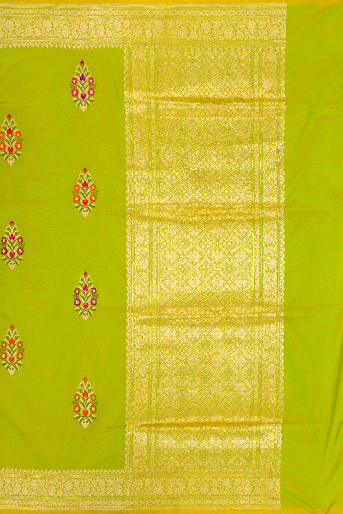 Close up image of the pallu of Pure Silk Parrot Green Dual Tone Banarasi Saree with Zari And Thread Butta on the body and Zari Border. 