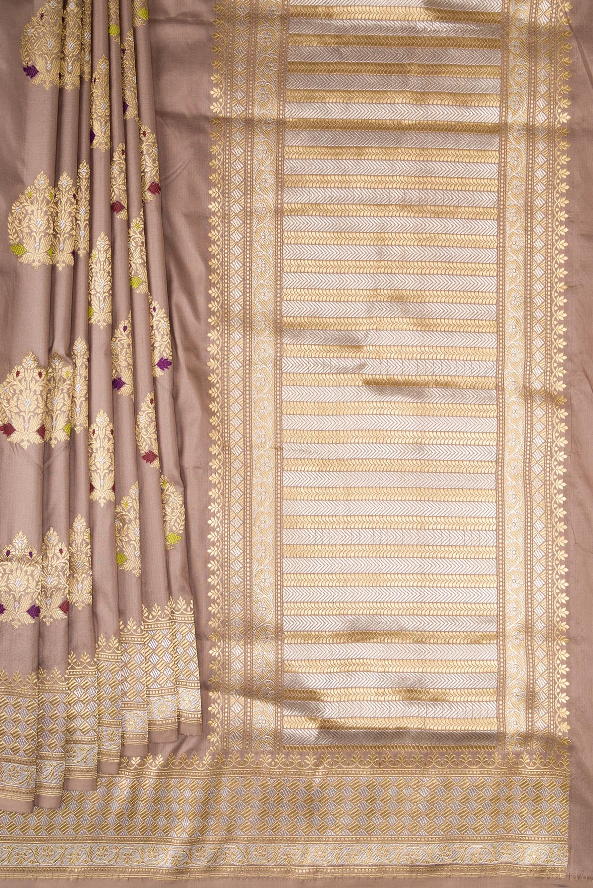 Pleats and pallu of Pure Silk Brown Banarasi Saree with Zari And Thread Butta on the body and Zari Border. 