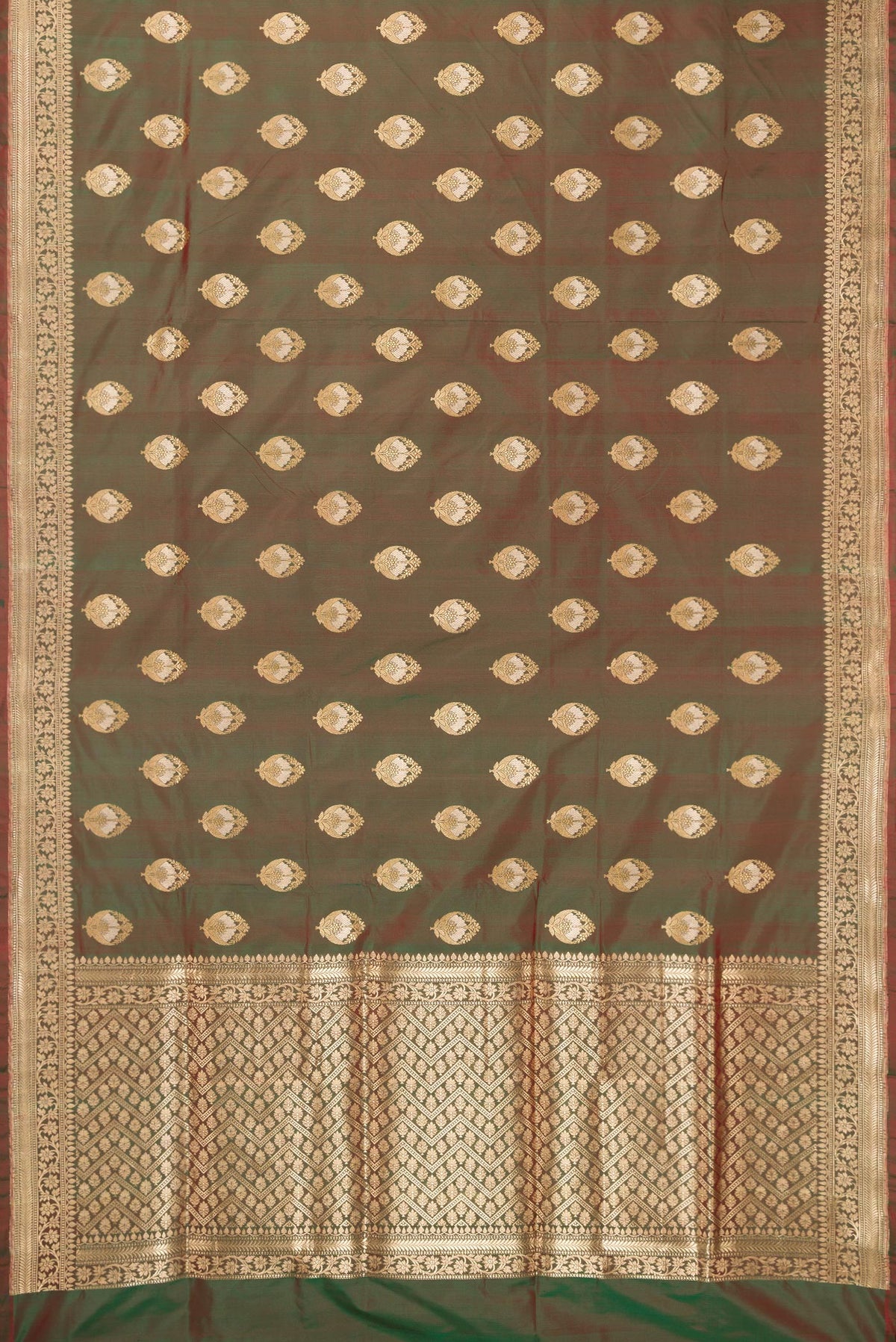 Flat view of Pure Silk Mehandi Green Dual Tone Banarasi Saree with Zari And Thread Butta on the body and Fancy Border. 