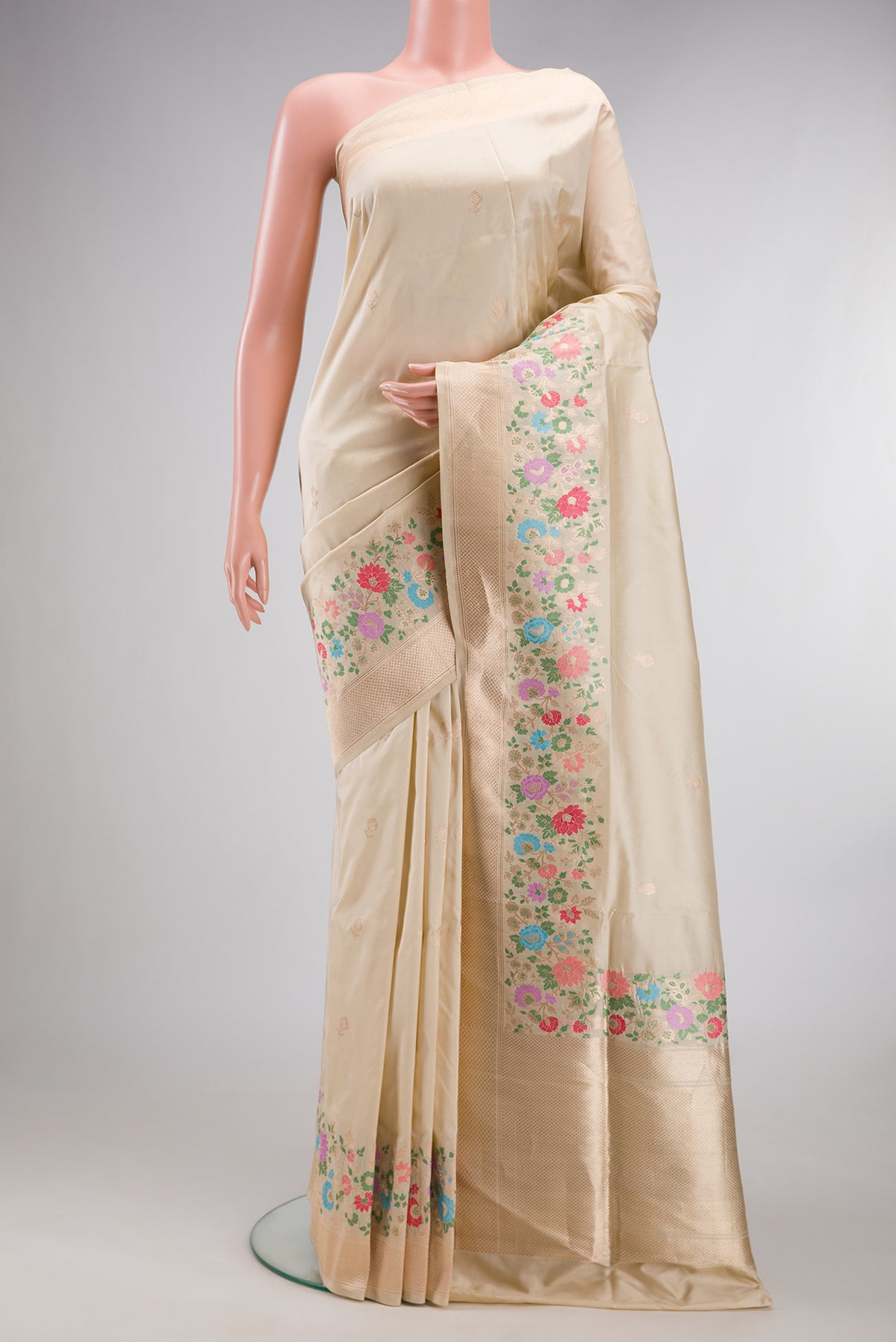 Pure Silk Sandal Banarasi Saree with Zari Butta on the body and Fancy Border.  displayed on a mannequin