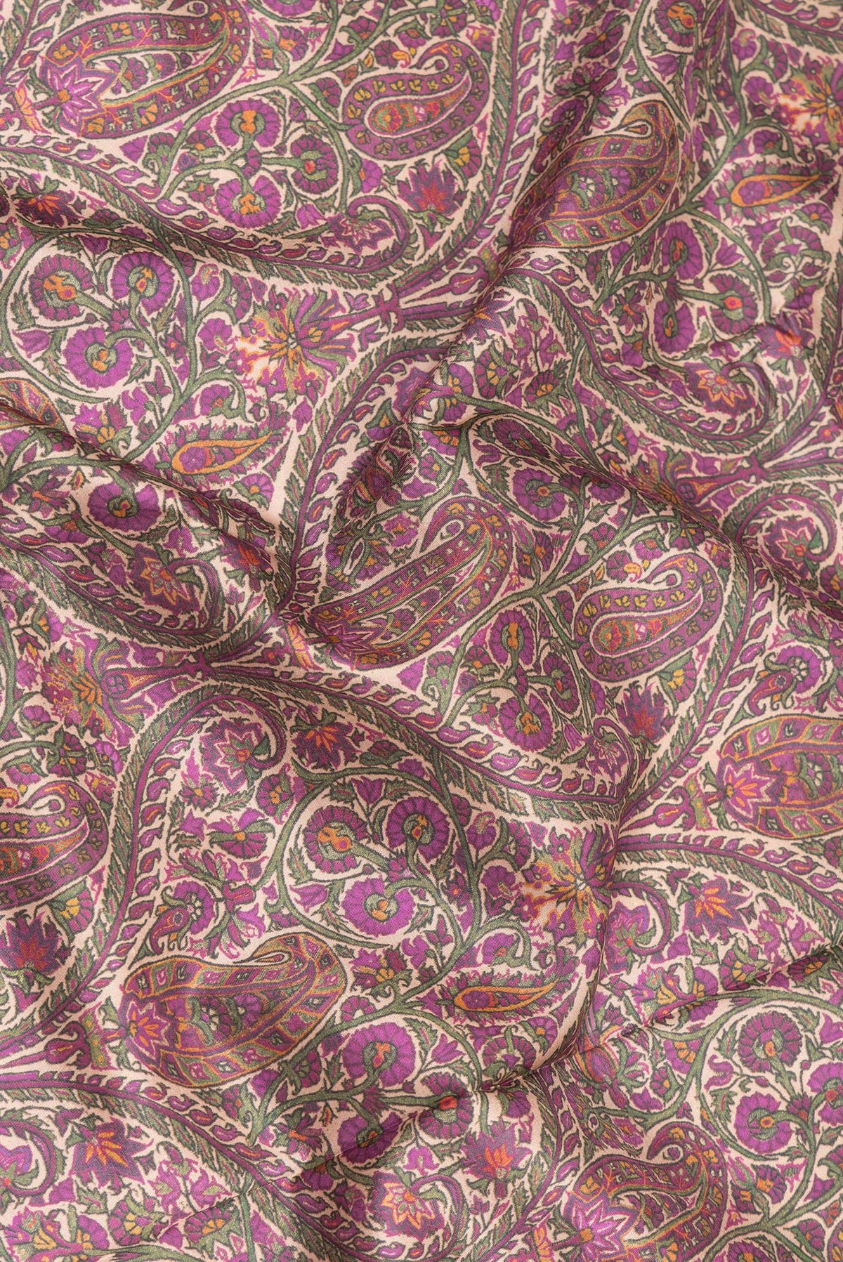 Close up of Pure Silk Purple Dual Tone Kanchipuram Saree with Printed design on the body and Zari Border.  displaying folds