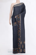 Black Mysore Crepe Saree with Plain Body and Printed Border.  displayed on a mannequin
