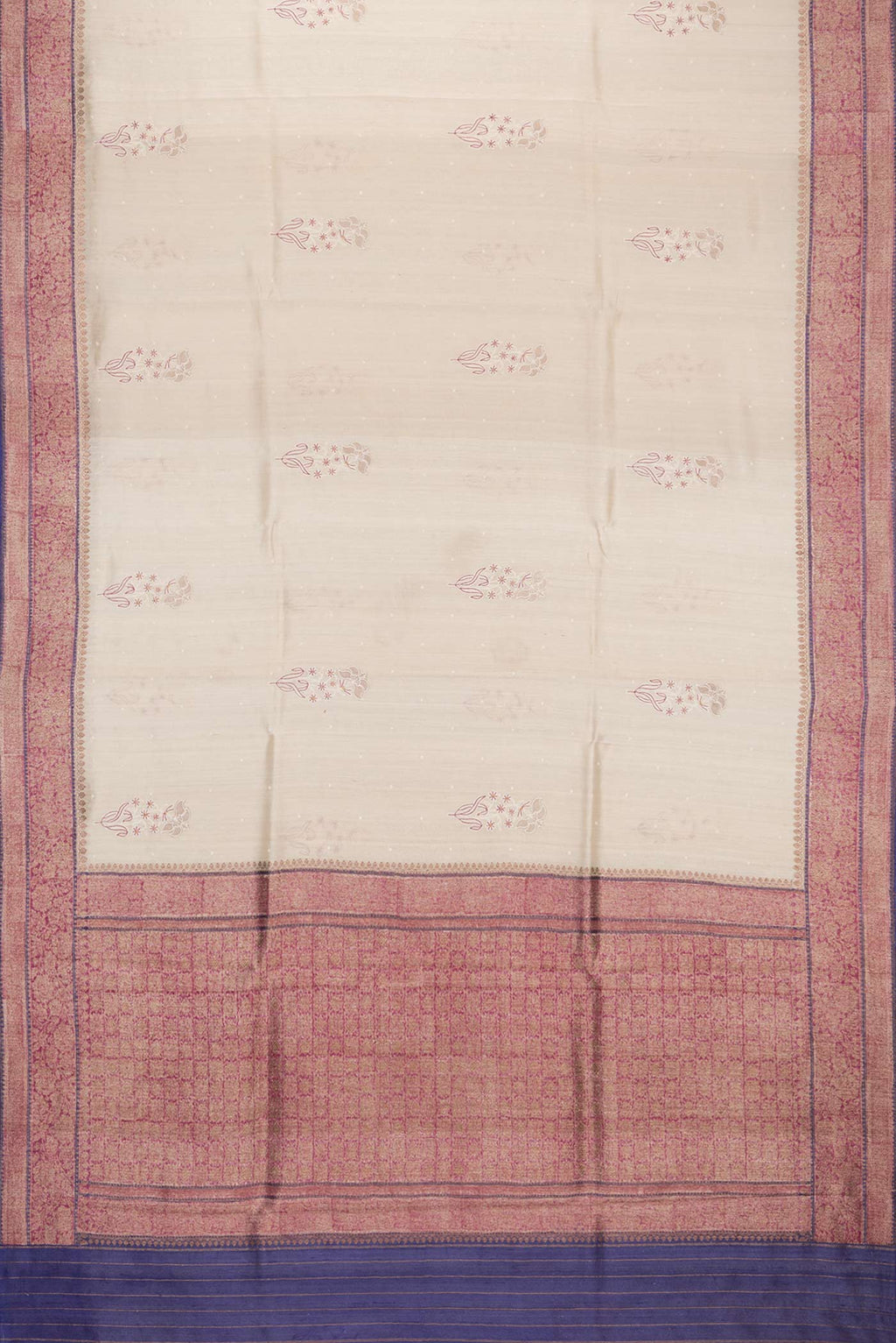 Flat view of Cream Tussar Saree with Embroidered on the body and Zari Border. 