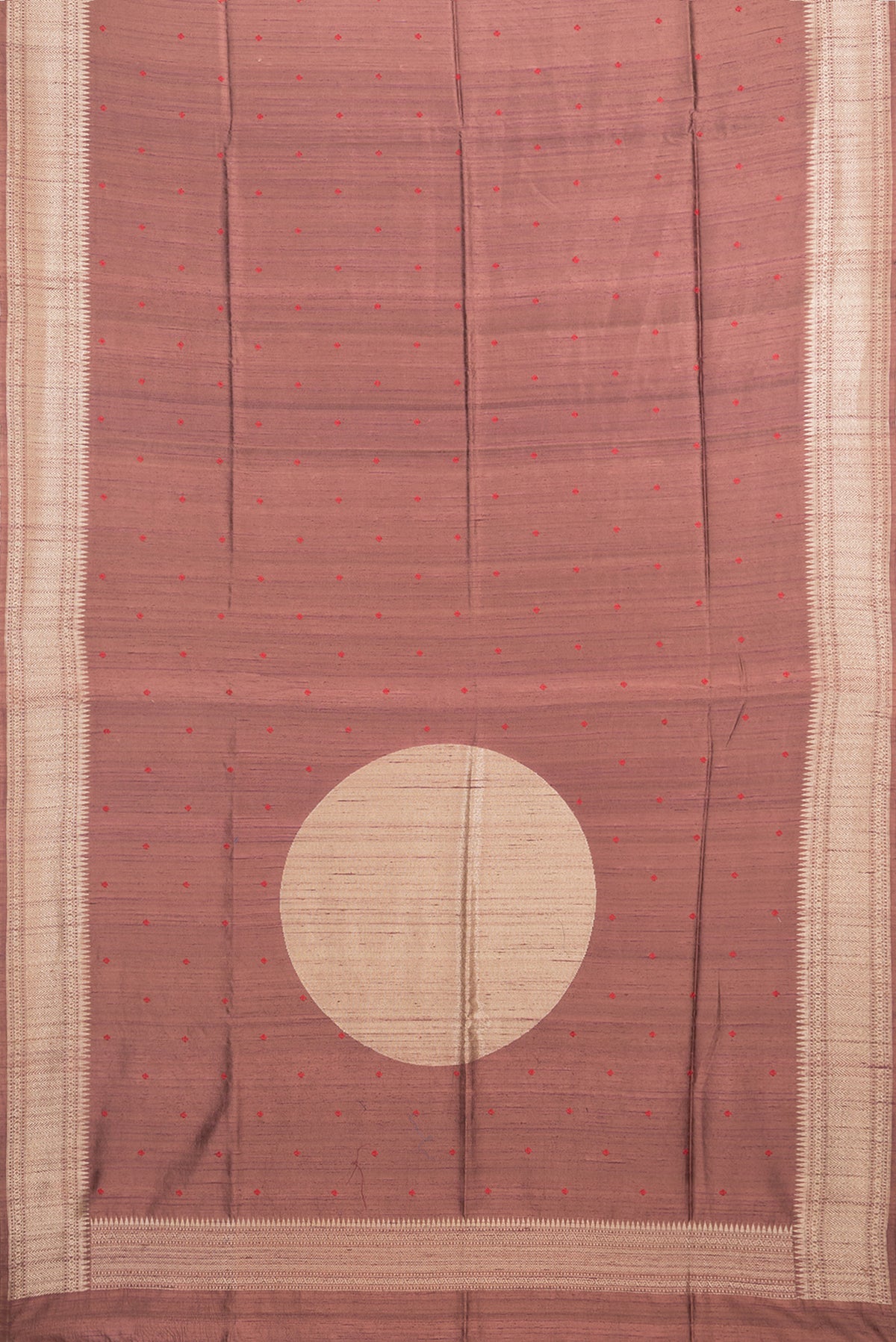 Flat view of Brown Tussar Saree with Embroidered on the body and Zari Border. 