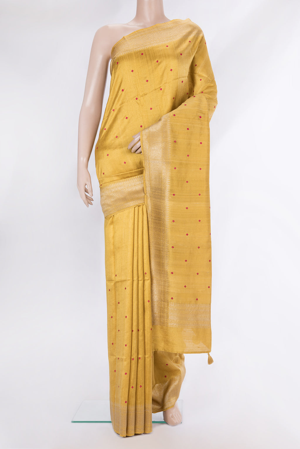 Pure Silk Sandal Dual Tone Raw Saree with Embroidery on the body and Zari Border.  displayed on a mannequin