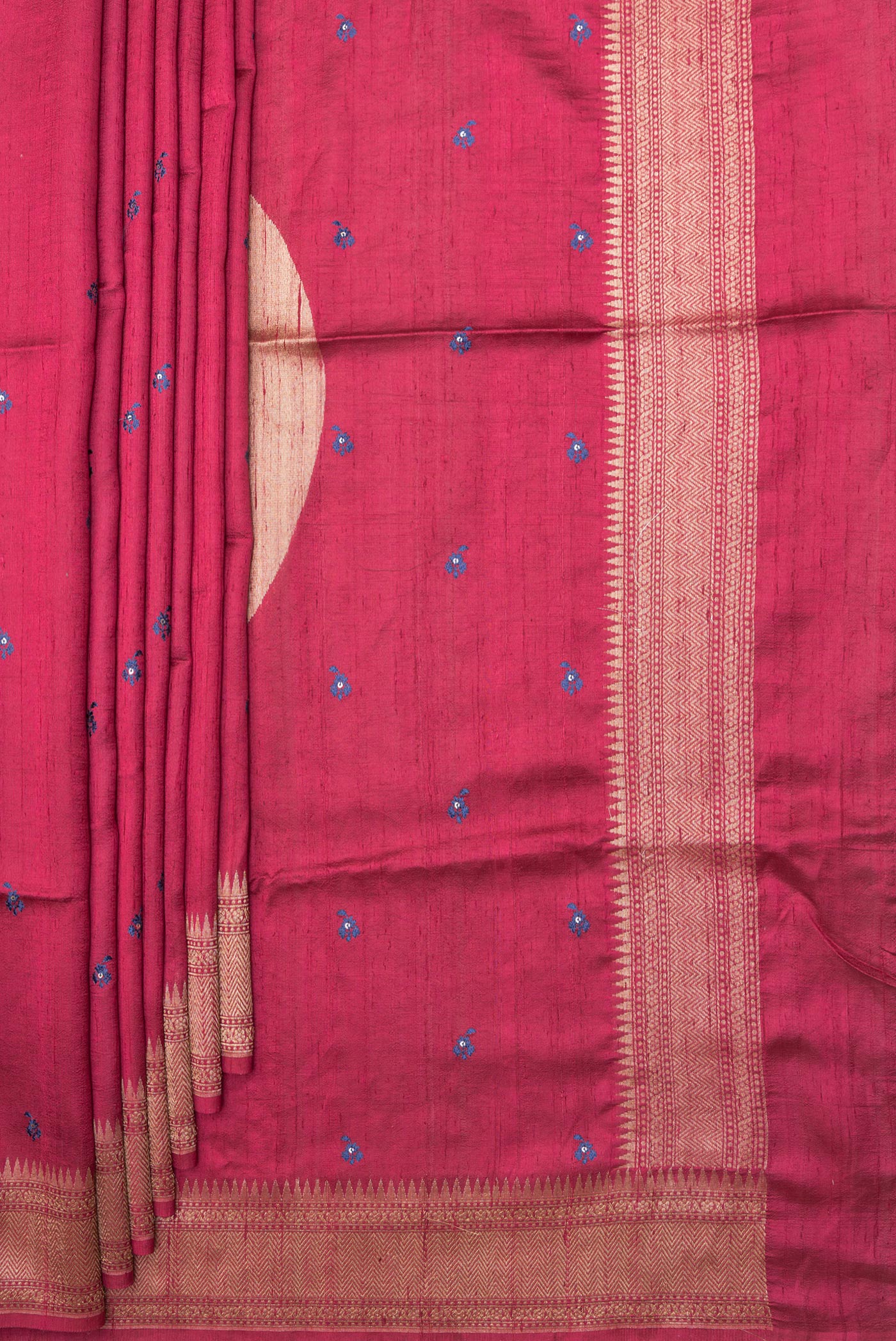 Pleats and pallu of Pure Silk Dark Pink Tussar Saree with Embroidery on the body and Zari Border. 