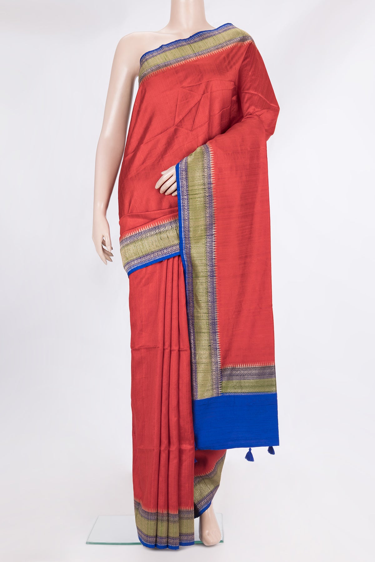 Pure Silk Red Tussar Saree with Plain Body and Zari Border.  displayed on a mannequin