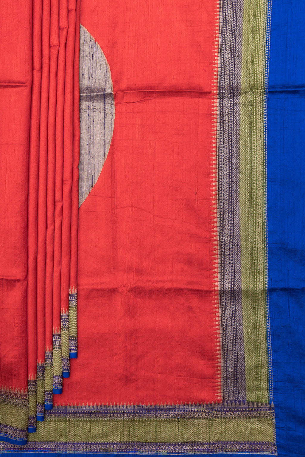 Pleats and pallu of Pure Silk Red Tussar Saree with Plain Body and Zari Border. 