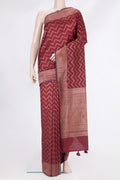 Pure Silk Maroon Tussar Saree with Zig Zag design on the body and Zari Border.  displayed on a mannequin