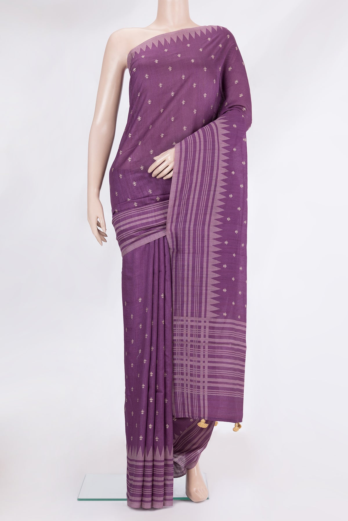 Purple Tussar Silk Saree with Embroidery on the body and Fancy Border.  displayed on a mannequin