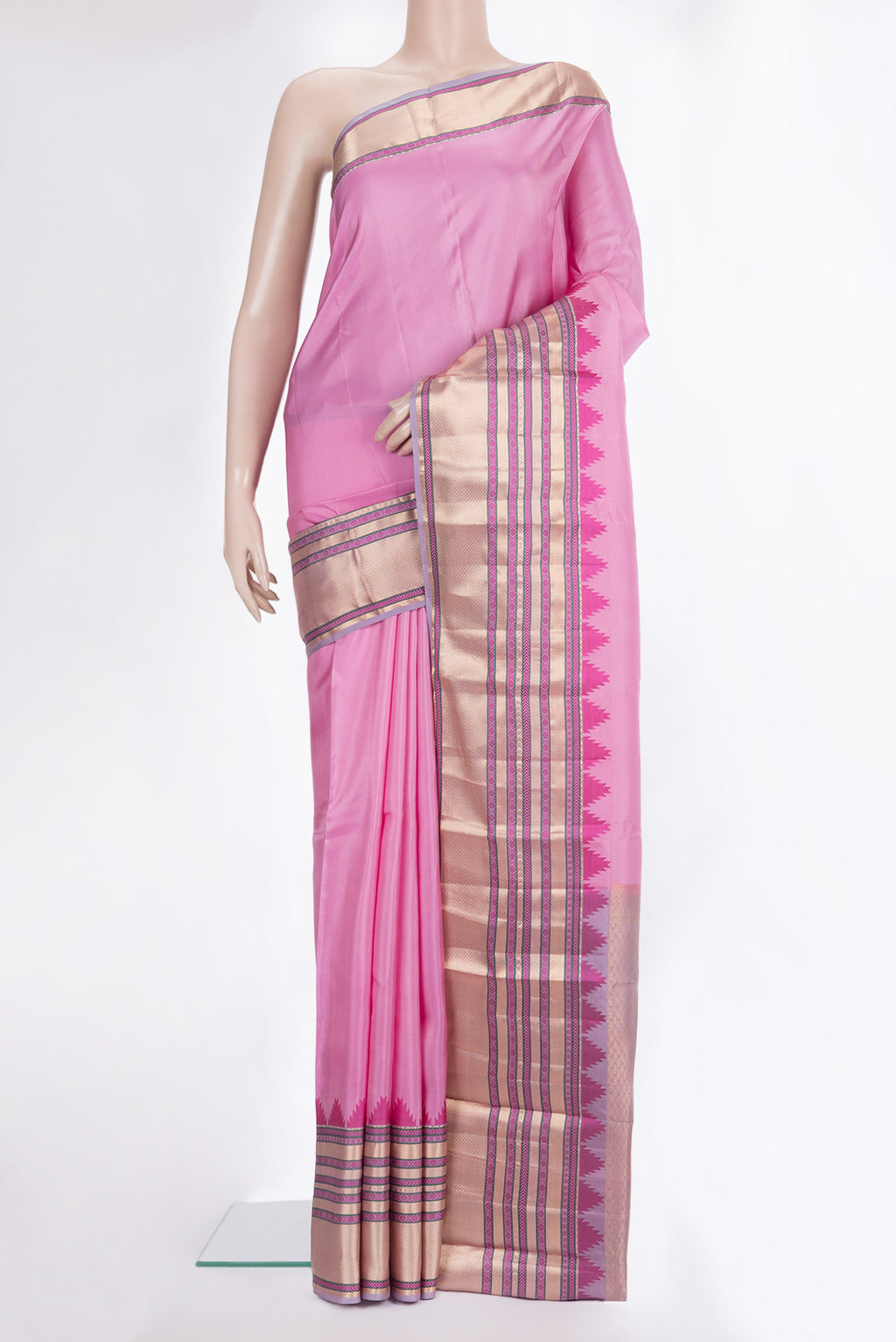 Pure Silk Rose pink Kanchipuram Saree with Plain Body and Temple Border.  displayed on a mannequin
